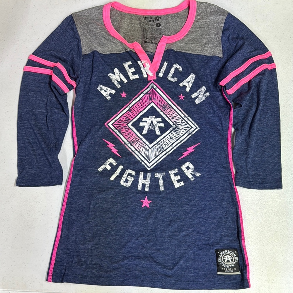 BUCKLE American Fighter Women’s Blue and Pink Henley V Neck Long Sleeve Shirt